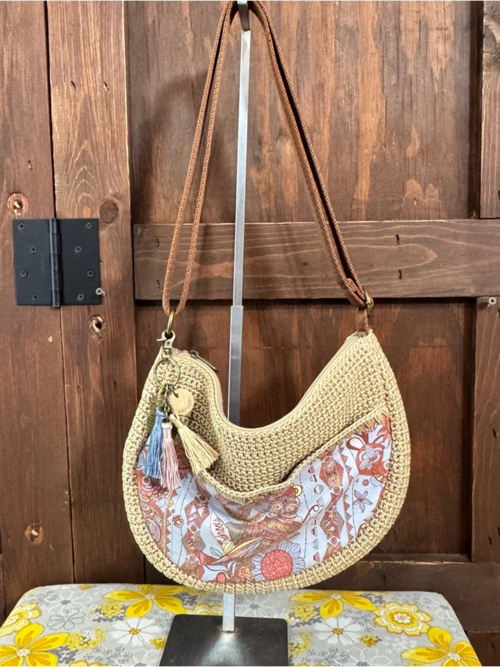 The Sak Beige Crochet Crescent Shoulder Bag with Floral Panel
